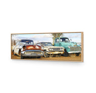Row of Rusty Cars