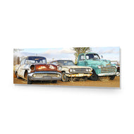 Row of Rusty Cars