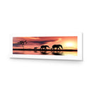 Family of Elephants at Sunset