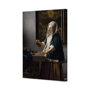 Woman Holding a Balance by Johannes Vermeer