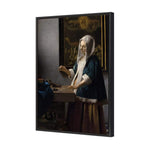 Woman Holding a Balance by Johannes Vermeer