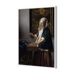 Woman Holding a Balance by Johannes Vermeer
