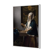 Woman Holding a Balance by Johannes Vermeer
