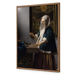 Woman Holding a Balance by Johannes Vermeer