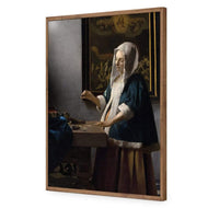 Woman Holding a Balance by Johannes Vermeer