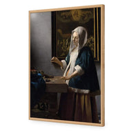 Woman Holding a Balance by Johannes Vermeer