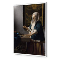 Woman Holding a Balance by Johannes Vermeer