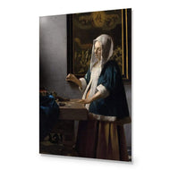 Woman Holding a Balance by Johannes Vermeer