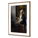 Woman Holding a Balance by Johannes Vermeer