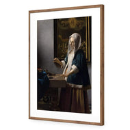 Woman Holding a Balance by Johannes Vermeer