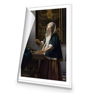 Woman Holding a Balance by Johannes Vermeer