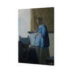 Woman in Blue Reading a Letter by Johannes Vermeer