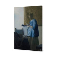 Woman in Blue Reading a Letter by Johannes Vermeer