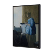 Woman in Blue Reading a Letter by Johannes Vermeer