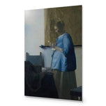 Woman in Blue Reading a Letter by Johannes Vermeer