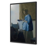 Woman in Blue Reading a Letter by Johannes Vermeer
