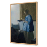 Woman in Blue Reading a Letter by Johannes Vermeer