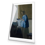 Woman in Blue Reading a Letter by Johannes Vermeer